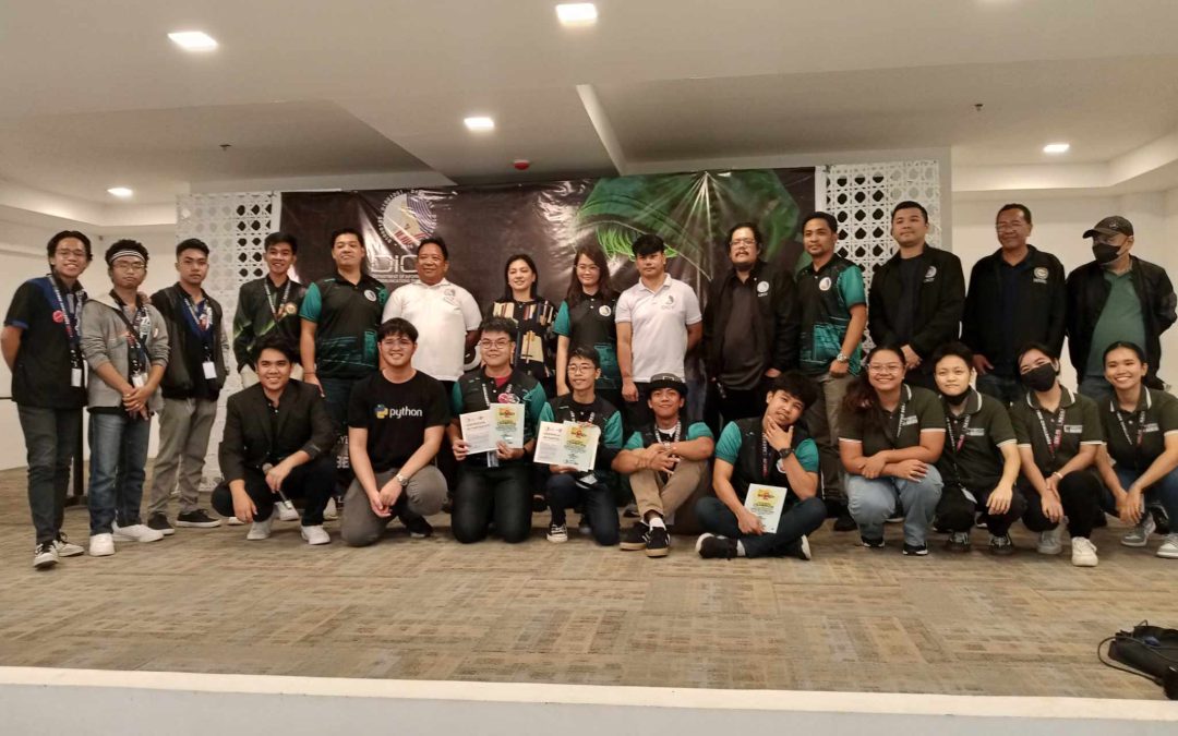 Zer0day team celebrating Champion at the 2023 Regional Hack4Gov Competition with DICT banner and certificates
